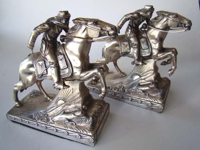 An EXTREMELY RARE pair of PONY EXPRESS bookends by Jennings Brothers circa 1940